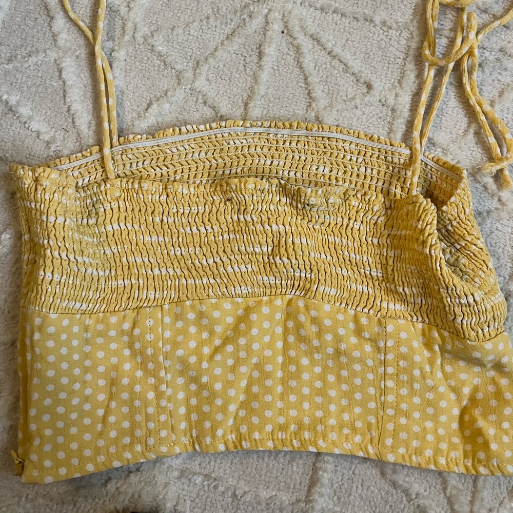 Yellow Zara tank top.